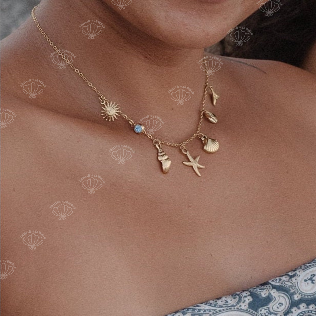 Personalized birthstone pendant necklace with a freshwater pearl worn at the neck