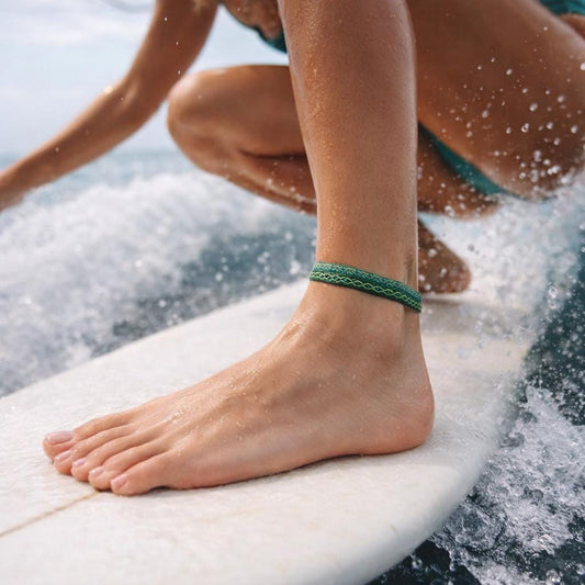 Hand woven boho anklet on an ankle