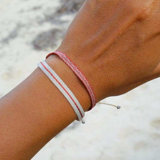 Braided wax cord surfer bracelet on a wrist