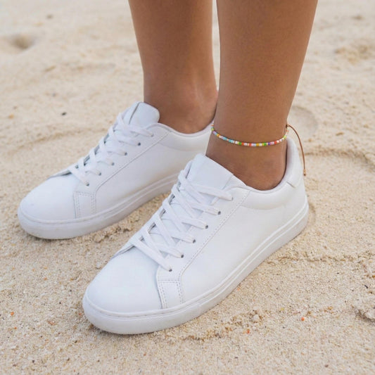 Rainbow glass bead anklet on an ankle