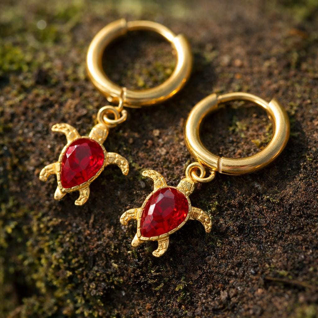 Gold Sea Turtle Huggie Earrings - scale and proportion view on skin (6)